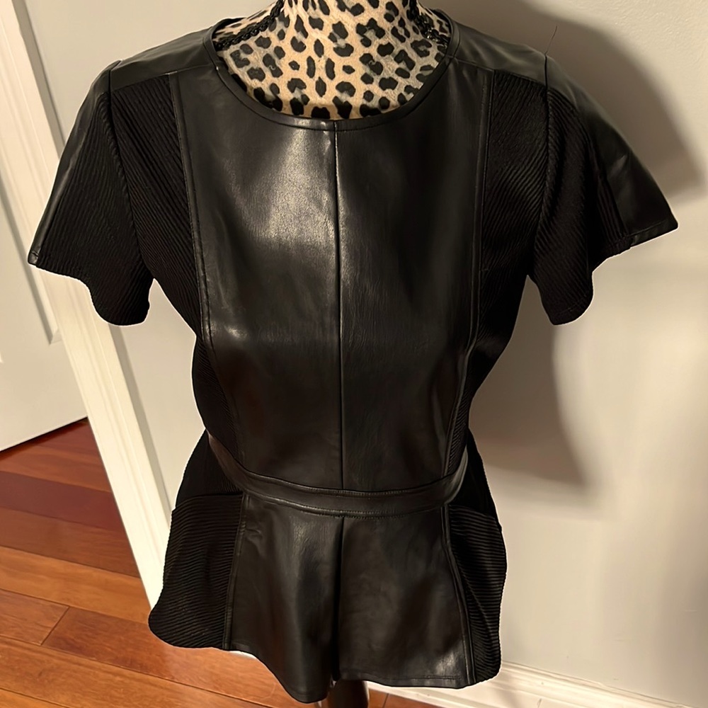 Faux Leather Peplum Top So cute with dressy pants or even Jeans. Never worn